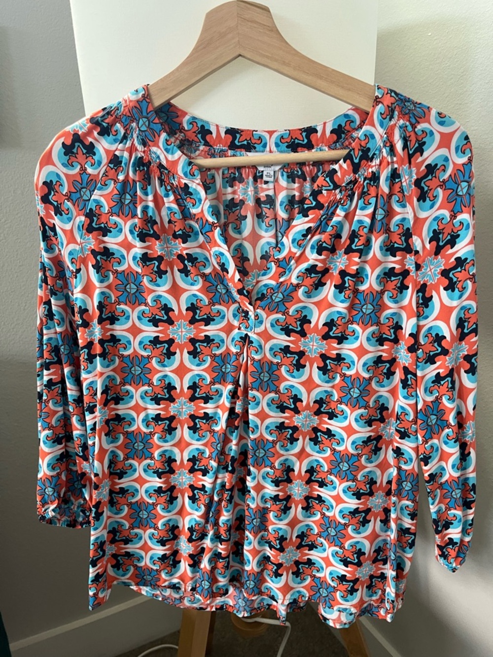 crown & ivy Coral and Turquoise Geometric Print V-Neck Blouse